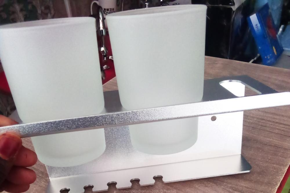 TOOTH BRUSH HOLDER