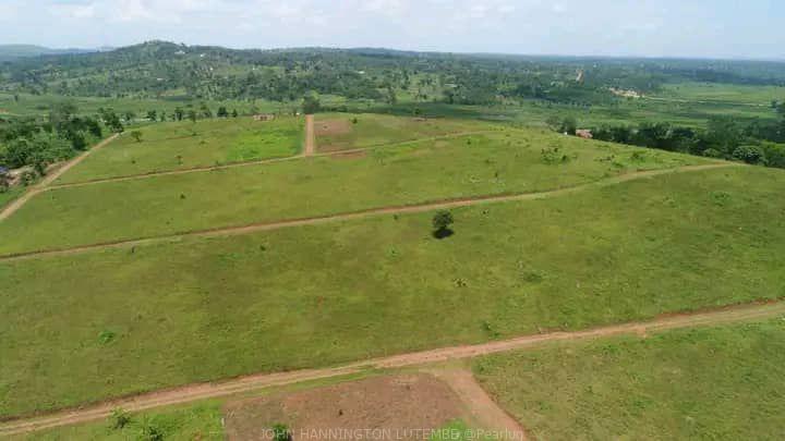 TITLED RESIDENTIAL PLOTS FOR SALE MEASURED 50*100FT WITH READY LAND AT AFFORDABLE PRICE OF 13MILLION
