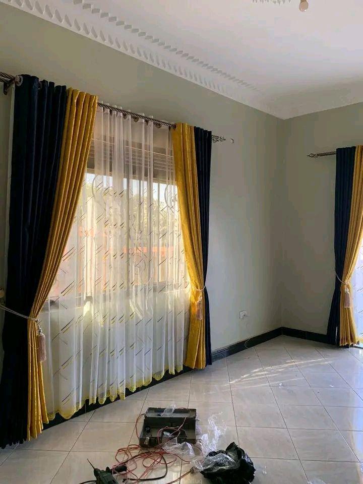 Curtains, curtain rods and cushions