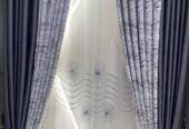 Curtains, curtain rods and cushions