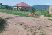 TITLED RESIDENTIAL PLOTS FOR SALE MEASURED 50*100FT WITH READY LAND AT AFFORDABLE PRICE OF 13MILLION
