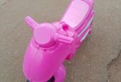 Pink toy motorcycle