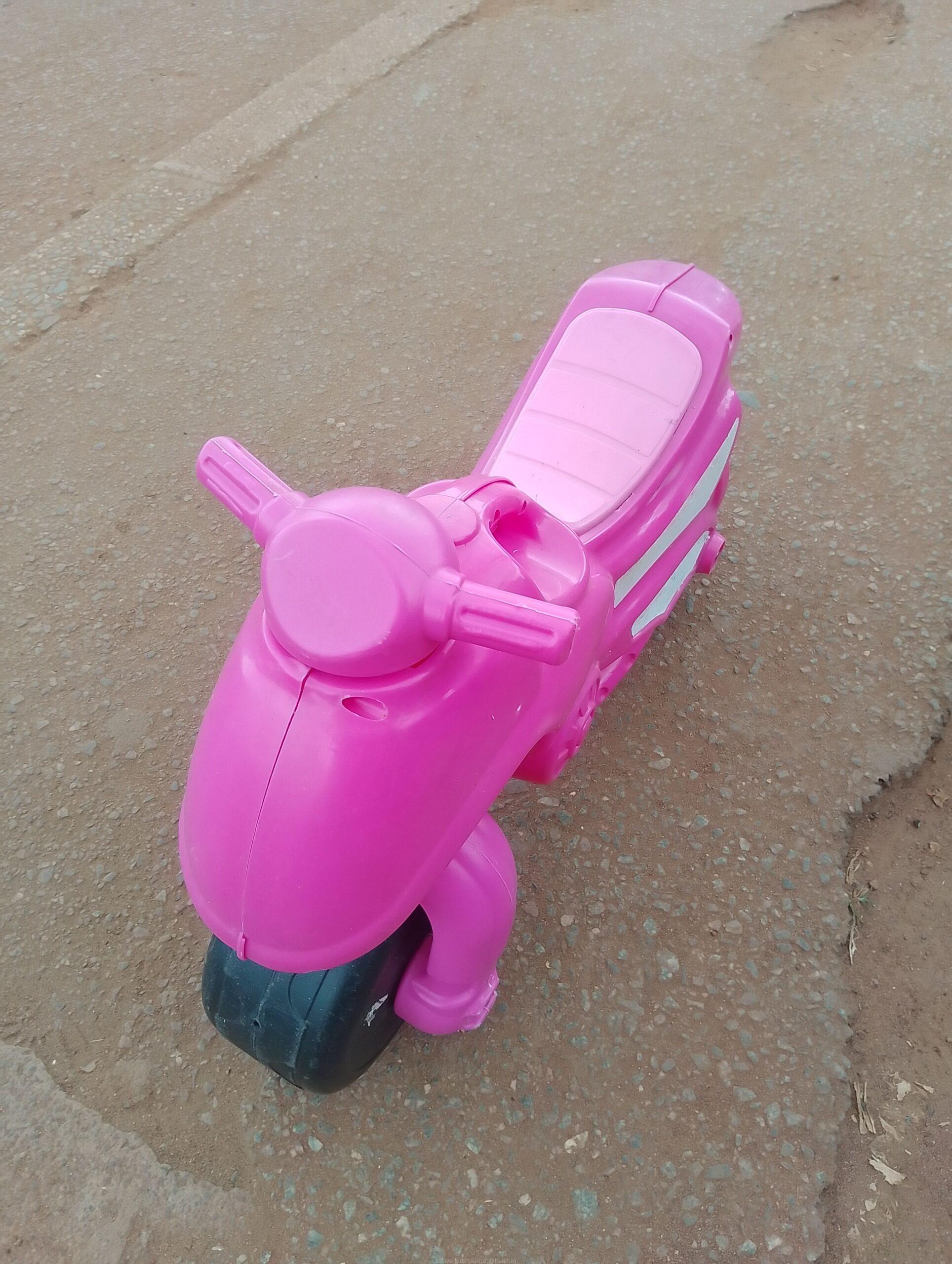 Pink toy motorcycle