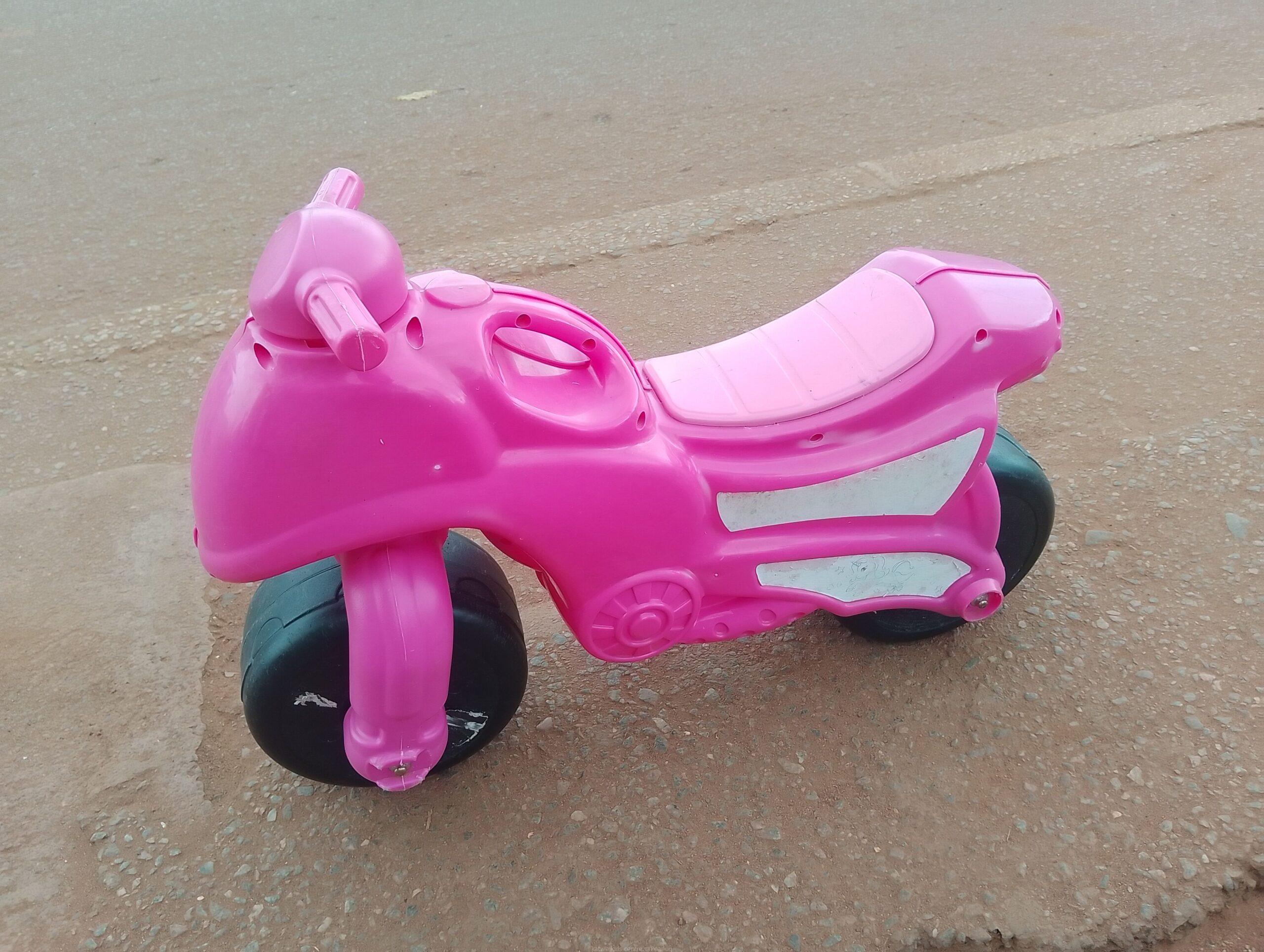 Pink toy motorcycle