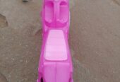 Pink toy motorcycle