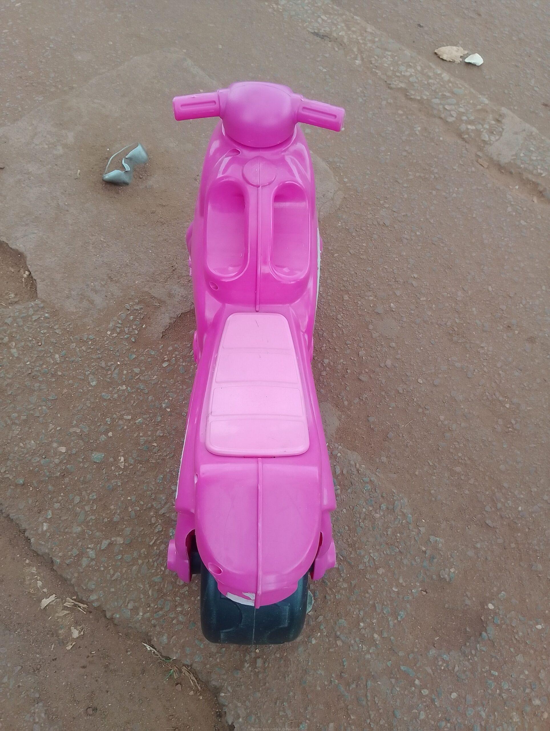 Pink toy motorcycle