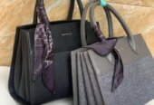 Demure handbags