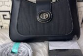 Demure handbags