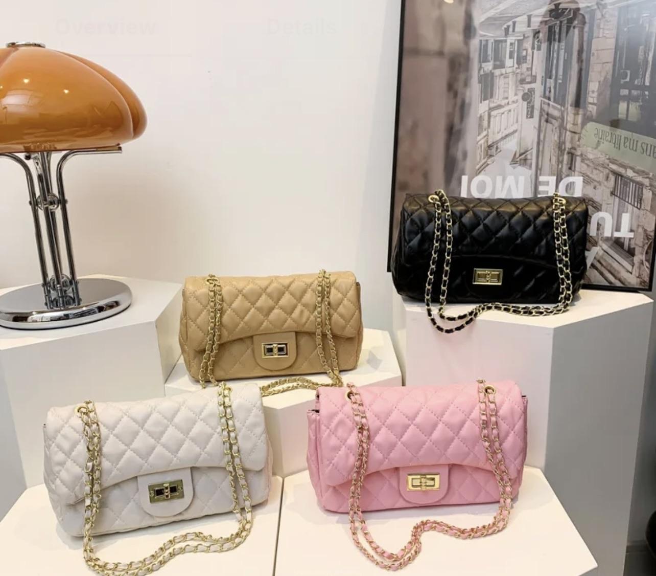 Demure handbags