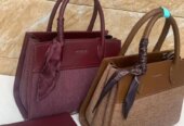 Demure handbags