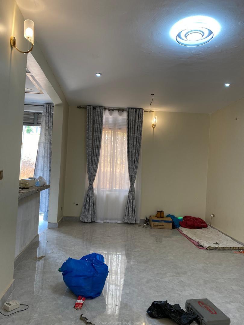 Curtains done and installed by us.