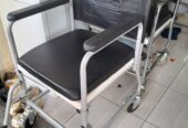 A commode pot (wheelchair)