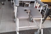 A commode pot (wheelchair)