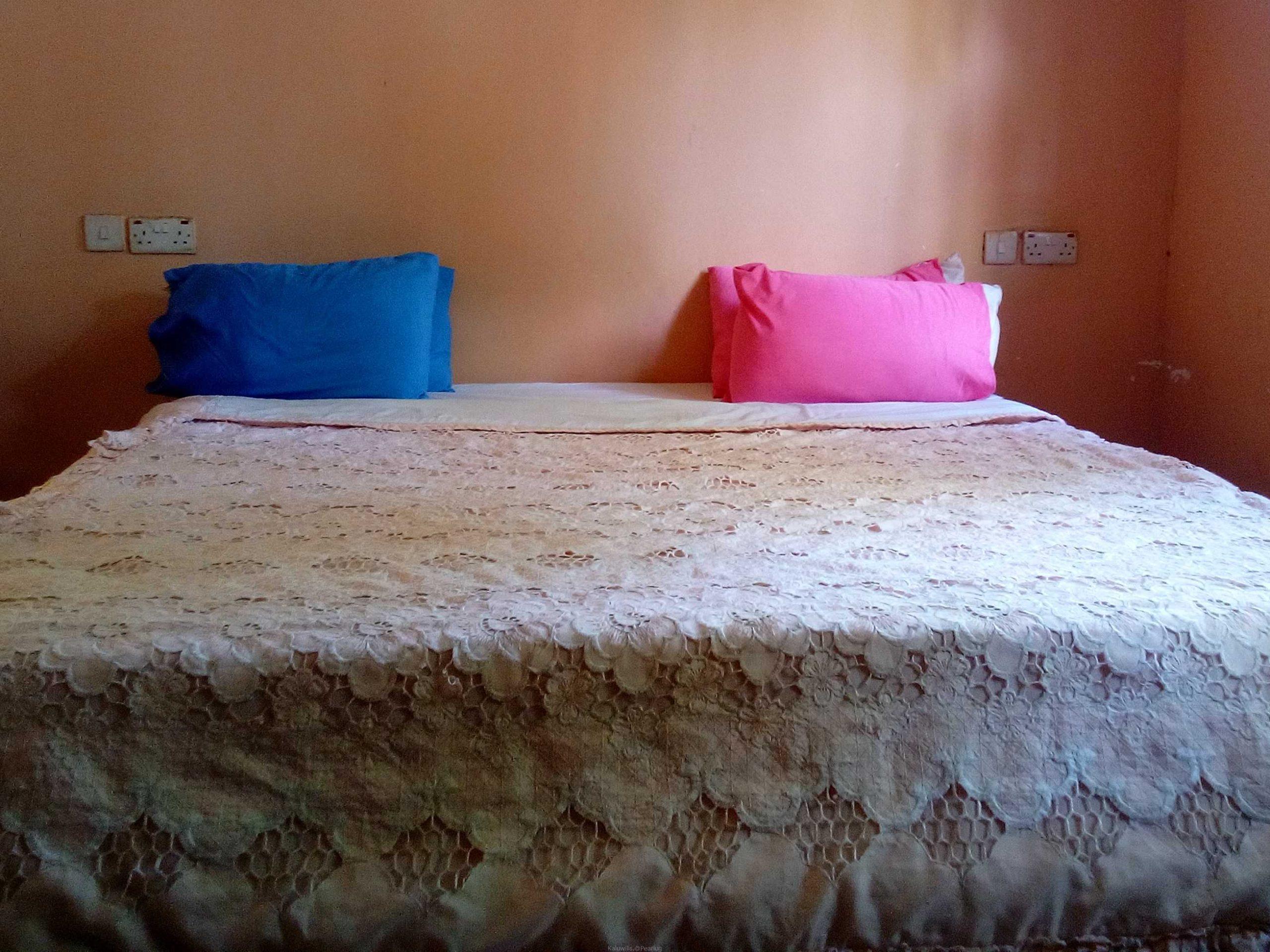 5×6 Bed For Sale Good condition,Used, With mattress Minor Scratches , Kampala