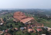 LAND FOR SALE WITH TITLES AT MUYOMBA 1 KM FROM WAKISO HEAD QUARTERS. WE ALSO HAVE PLOTS IN KIBANJA AT KAKIRI RAGING FROM 6M IN BUWANUKA
