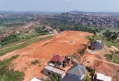 LAND FOR SALE WITH TITLES AT MUYOMBA 1 KM FROM WAKISO HEAD QUARTERS. WE ALSO HAVE PLOTS IN KIBANJA AT KAKIRI RAGING FROM 6M IN BUWANUKA