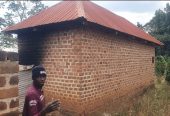 A plot (100x45ft ) plus a house for 14 million only
