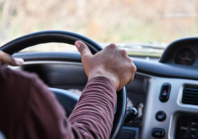man-driving-car-driver-hands-on-steering-wheel-driving-my-car-on-the-road-free-photo